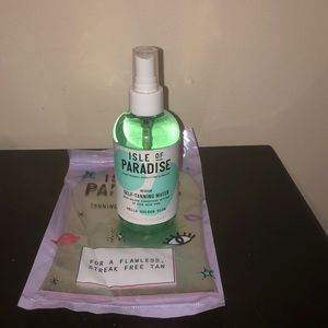 ISLE OF PARADISE TANNING WATER IN MEDIUM AND MITT